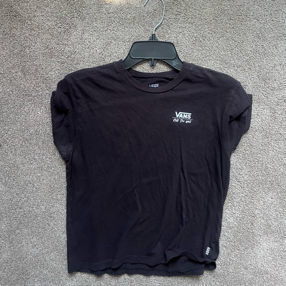 Black tee and design on the back.